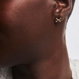 Tiny Bow Stud Earrings in 14k Yellow Gold - view 2